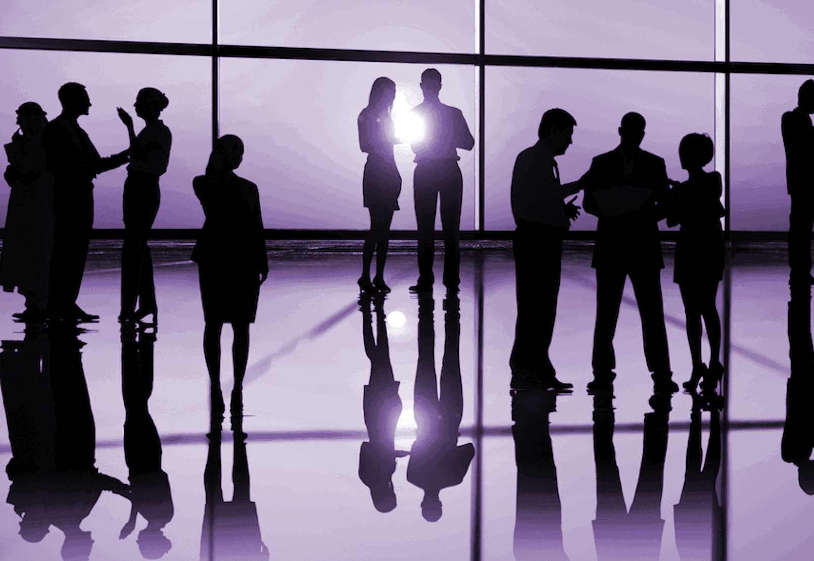 People at conference in silhouette